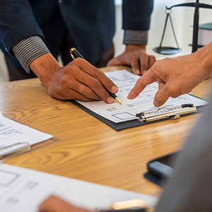  Attorneys review the Oklahoma probate process: a step-by-step guide for families, with legal documents and scales. 